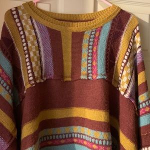 Easel sweater size Large.  Sleeves fitted body slightly cropped and oversized.